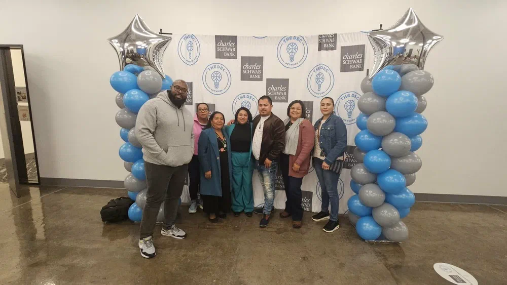 Julia Garrido with a group at a community event at The DEC