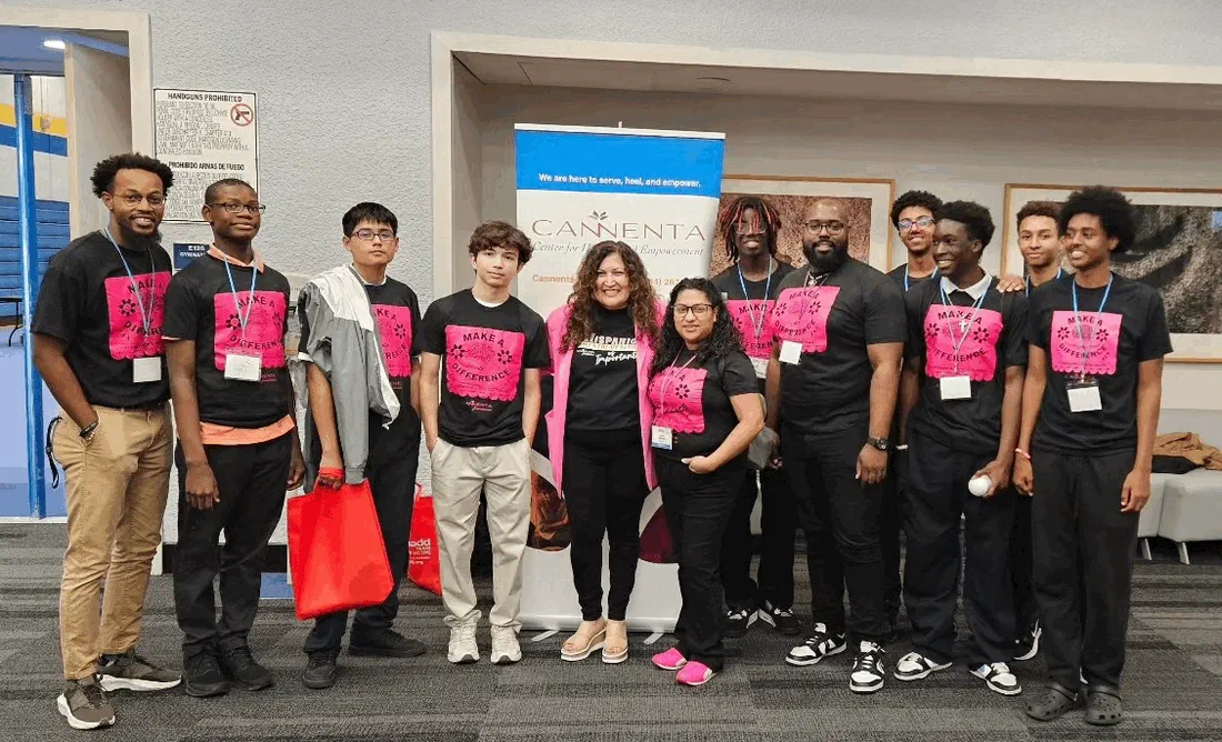 Julia Garrido with a group of students in Make a Difference shirts at a community event with CANNENTA
